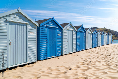 Colorful Beach Huts on the Sandy Beach in Charmouth, England