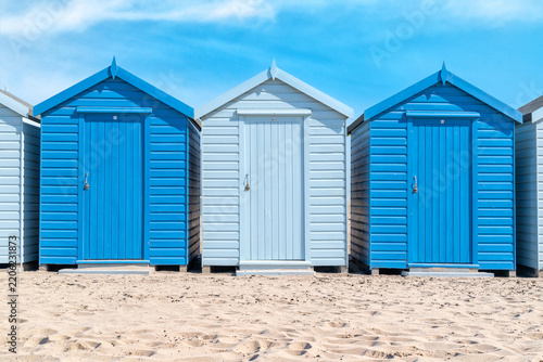Colorful Beach Huts on the Sandy Beach in Charmouth, England