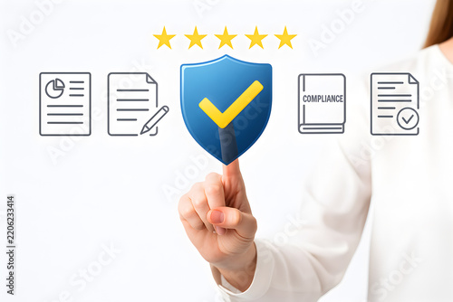 Hand pointing to blue security shield with yellow checkmark below five gold stars surrounded by compliance audit document icons on white background
