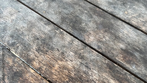 Diagonal high angle view of weathered wooden plank tiles