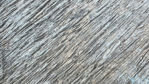 Abstract macro texture of weathered diagonal cement concrete background
