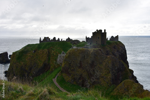 Overcast Sky Above Lonely Castle Ruins on Scottish Shore