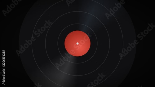 Vinyl record grooves spinning in macro close-up