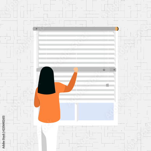 Woman operating a smart window blind with her hand