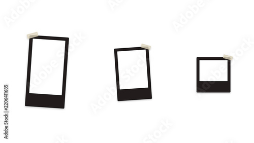 Three black photo frames taped to a white wall. Instant photography mockups with adhesive tape. Minimalist frame placeholders with white center areas for memory display and creative projects