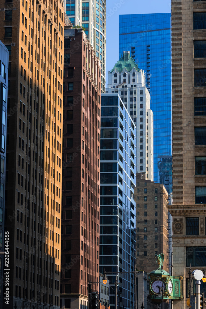 Obraz premium Chicago architecture blending historic Mather Tower with modern skyscrapers