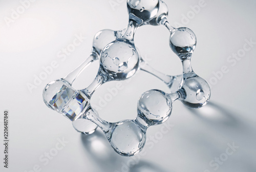 Clear liquid molecule structure on white background
