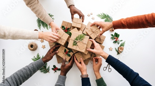 Diverse Hands Sharing Many Kraft Gift Boxes Pile On White Background Flat Lay