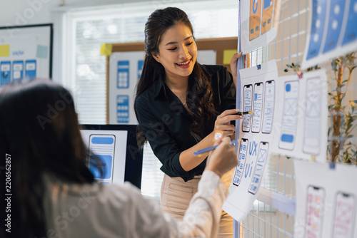 Designer presenting UX UI mobile application design.