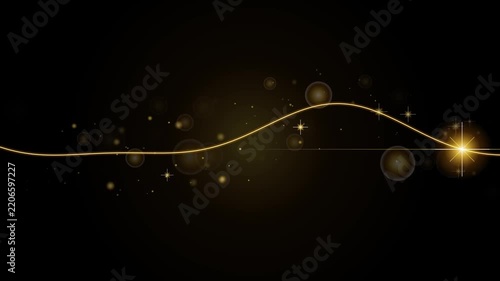 Golden light wave with glowing particles on dark background