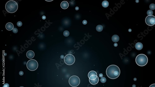Abstract floating blue bubbles motion graphic on dark background