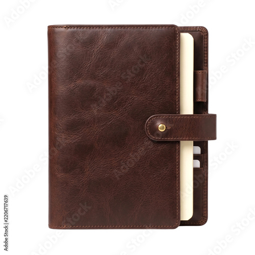 Closed brown leather planner notebook with gold snap closure and cream