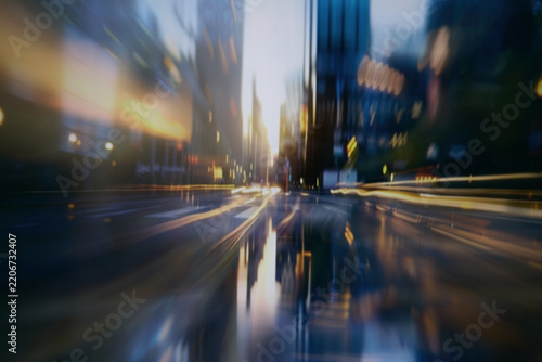 Blurred high speed data flow with glowing light trails and futuristic digital network