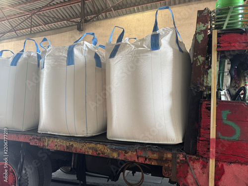 Chemical fertilizer Urea Stockpile white jumbo-bag Large ammonia nitrate in waiting for shipment is placed in the warehouse. Transport for farmers