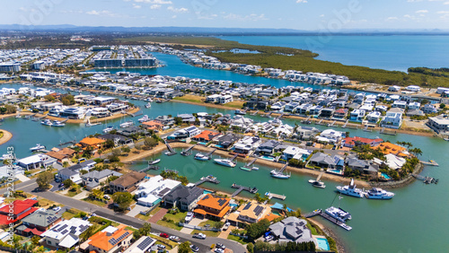 Aerial View of Scarborough Waterfront and Residential Canals, Queensland Australia