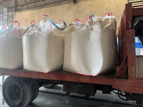 Chemical fertilizer Urea Stockpile white jumbo-bag Large ammonia nitrate in waiting for shipment is placed in the warehouse. Transport for farmers