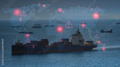 Global cargo ship navigates ocean facing maritime supply chain risk with tense digital world map showing trade disruption