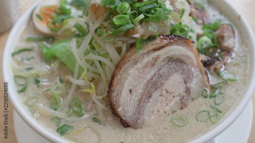 Thick pork slice and bean sprouts on Jiro style ramen