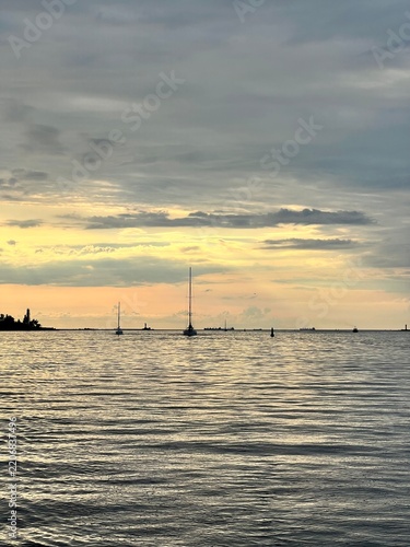 Yacht at sea at sunset