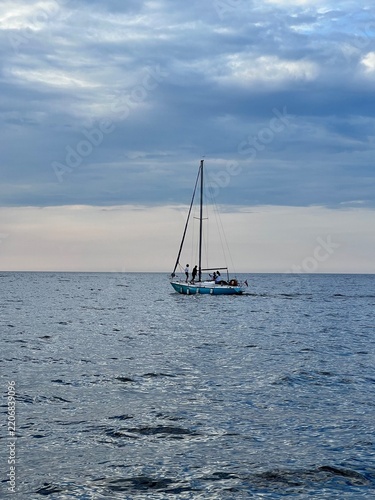 Yacht at sea at sunset