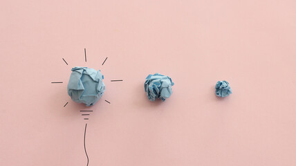Education concept image. Creative idea and innovation. Crumpled paper as light bulb metaphor