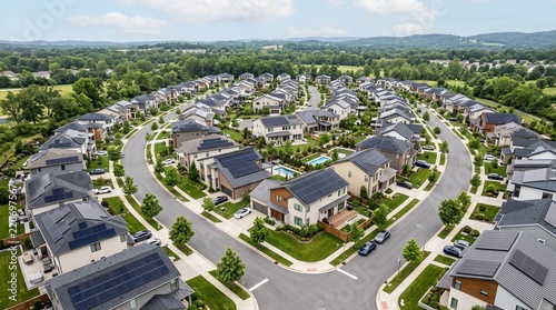 Aerial View of Sustainable Eco Friendly Suburban Neighborhood with Solar Panels 