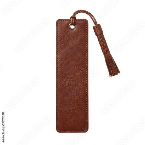 Leather bookmark with braided tassel isolated on black background with generous copy space for reading and stationery design