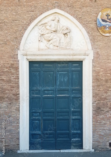 Historic Blue Door Archway Religious Relief