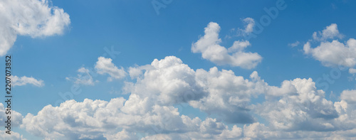 Blue sky with fluffy white clouds during daytime