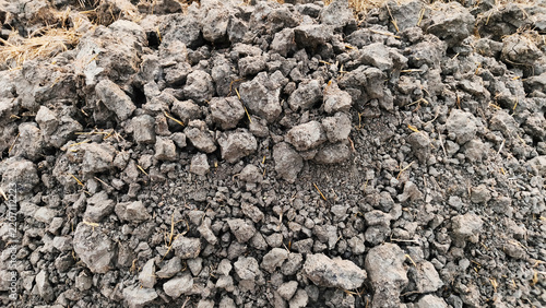 Coarse Brown Earth Surface with Small Rocks and Soil Particles