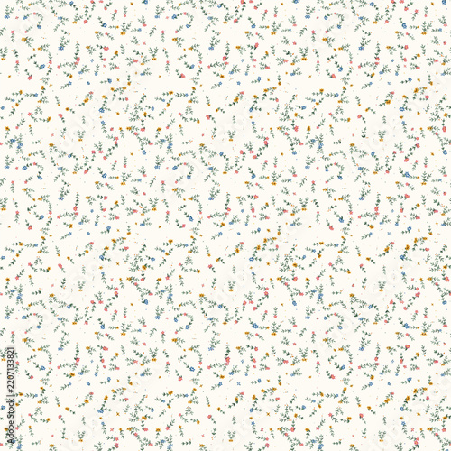 Delicate Ditsy Floral Pattern with Tiny Colorful Blooms on Light Cream Background