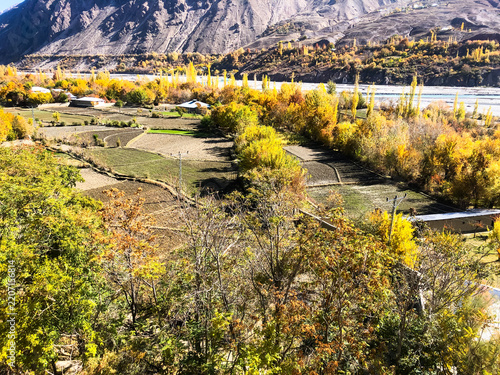 Autumn paints the terraced fields and villages of the Hindu Kush