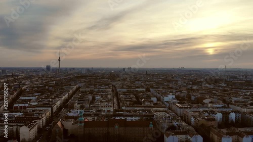 Aerial view of a city skyline at sunset