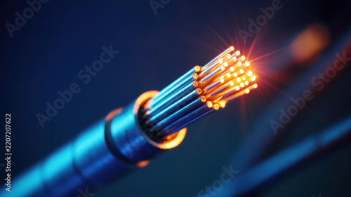 Fiber optic cable glowing with orange light on a dark background, technology
