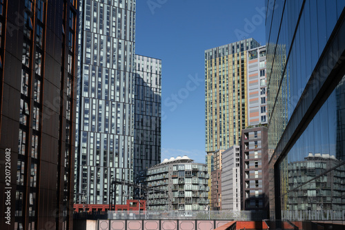 Fotografie Manchester Deansgate Square complex urban architecture under blue sky