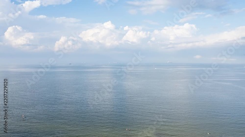 Aerial Hyperlapse: Expansive View of a Sunny Beach and Calm Sea, Perfect Summer Vacation