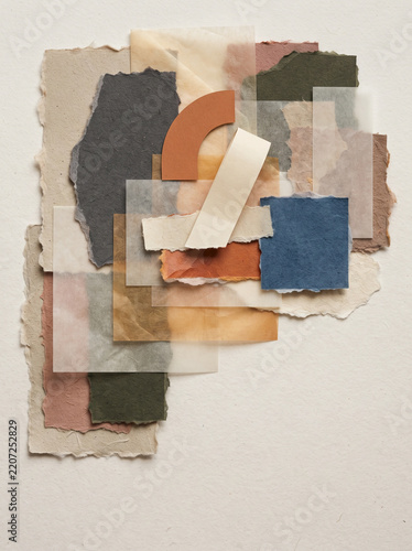 Layered torn paper collage with abstract shapes