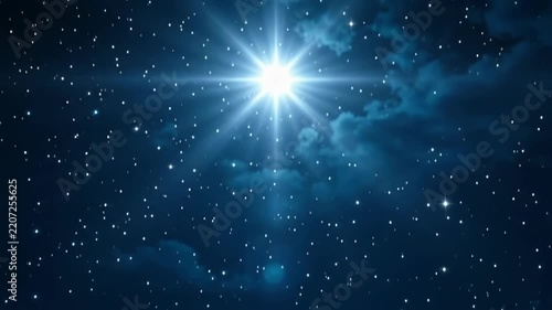 wooden shepherd crook on rock in night field panning to radiant shining star of bethlehem in starry sky. christian nativity miracle, religious christmas story, church worship background