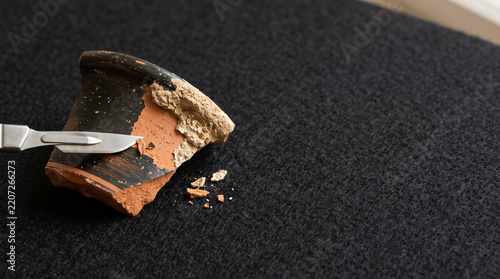 Micro Scalpel Removing Calcite Concretion on Greek Ceramic Rim