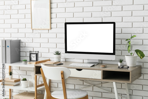 Remote work and home office setup, computer with blank screen for mockup on d...