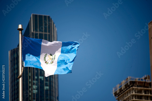 The Guatemalan flag on a flag pole at Toronto City Hall’s Nathan Phillips Square.

