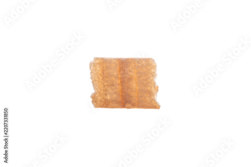 A rice cracker isolated against a white background.
