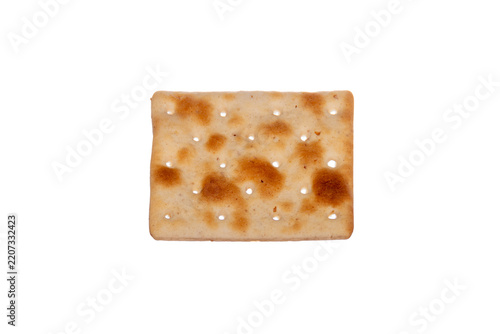 A cracker isolated against a white background.