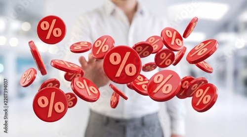 Businessman Reaching Towards Floating Red Discount Percentage Symbols in a Modern Office Environment