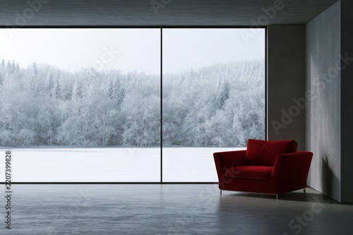 Armchair beside a window overlooking a snowy forest