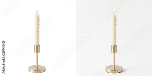 Candlestick in brass with a lit cream taper and wax drips shown as a PNG isolated on a transparent background for commercial holiday design projects
