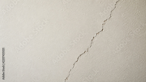 Cracked Plaster Wall Surface in Residential Interior