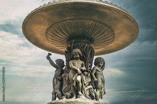 Looking up at the Bethesda Fountain basin and sculptures from below