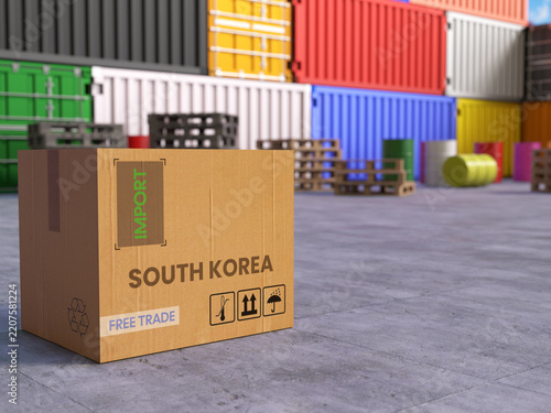 Cardboard Import Box with South Korea Text in Front of Stacked Shipping Containers