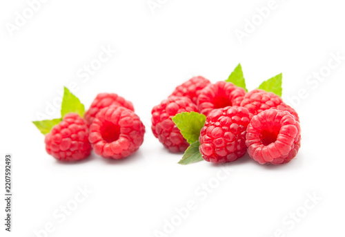 Sweet raspberries with leaves